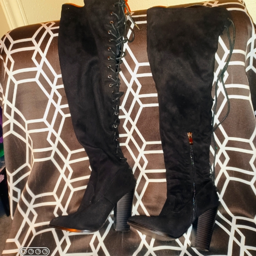 Black thigh high lace up boots